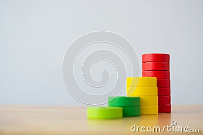 Wood block multicolor arranging stack step as staircase on wooden table Stock Photo