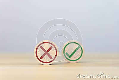 wood block showing right and wrong sign decision concept Stock Photo