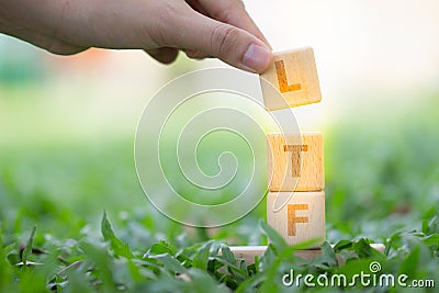 Wood block word LTF and RMF Stock Photo