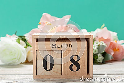 Wood blocks in box with date, day and month 8 March. Wooden blocks calendar Stock Photo