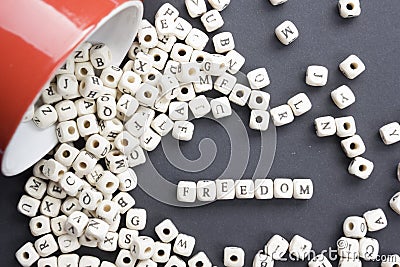 Wood Blocks with the word Feedom. Wooden ABC Stock Photo