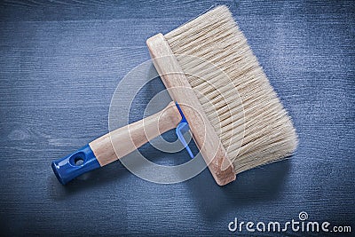 Wood board with paintbrush thick bristle Stock Photo