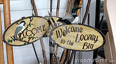 Wood carved welcome signs Stock Photo