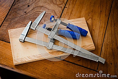 Wood clamps used to restore furniture Stock Photo
