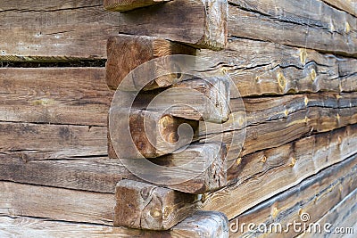 Wood corner of a old building with dovetail joints Stock Photo