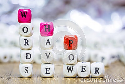 Wood dice with WORDS HAVE POWER Stock Photo