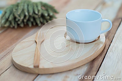Wood dish and coffe cup on wooden table.with Text Space Stock Photo