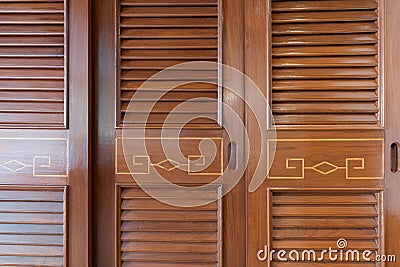 Wood door of an armoire background Stock Photo