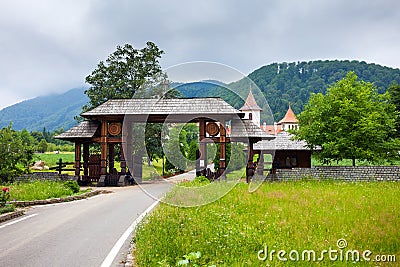 Wood entrance gate from Sambata de Sus Monastery in Transylvania Editorial Stock Photo