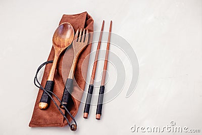Wood fork spoon chopstick set on light background Stock Photo
