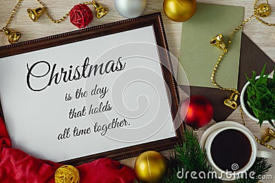 Wood frame with season`s greetings wish and ornament balls decoration. Christmas and holiday concepts. Stock Photo