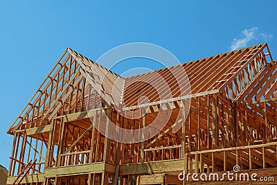 wood framework of new residential home under construction. Stock Photo