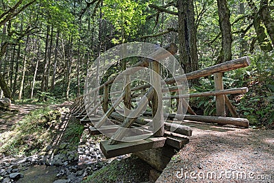 Wood Log Bridge Over Gorton Creek Stock Photo