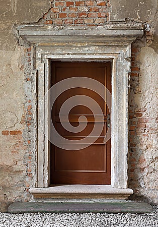 wood made doors on abandoned background Stock Photo