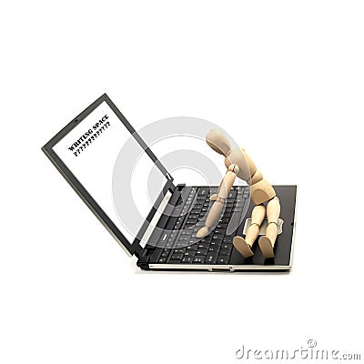 Wood mannequin and laptop Stock Photo