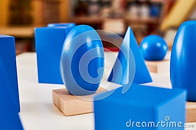 Wood Montessori geometrical solid volumes Stock Photo