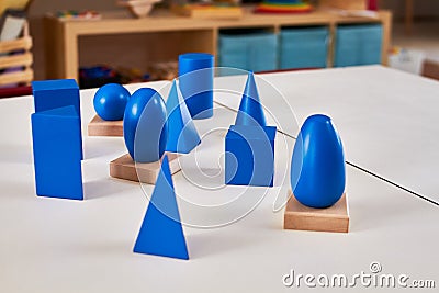 Wood Montessori geometrical solid volumes Stock Photo