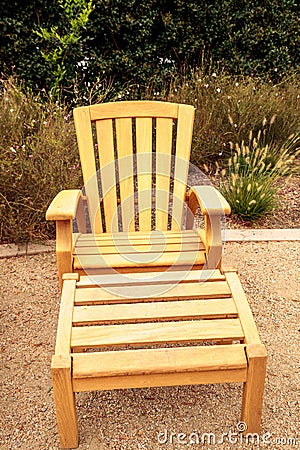 Wood patio lounge chairs in the backyard Stock Photo