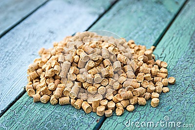 Wood pellets in the background. Biofuels. Wooden granules. Stock Photo