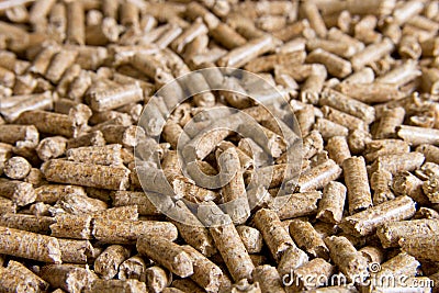 Wood pellets close up .Biofuels. Biomass Pellets - cheap energy. The cat litter Stock Photo