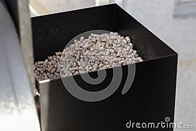 Wood pellets in a smoker pellet box for barbecue Stock Photo