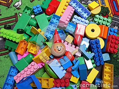 Wood and plastic cubes Stock Photo