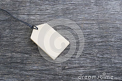 Wood price tag on wood floor in background with copy space for some text, advertise, promotion, sale concept Stock Photo