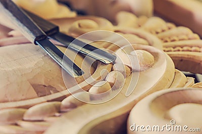 Wood processing. Joinery work. wood carving. a wood carvings, tools on the wooden background close up. retro effect. vintage style Stock Photo