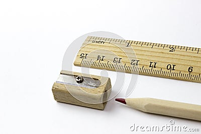 Wood ruler, pencil and pencil sharpener. Free royalty images. Stock Photo