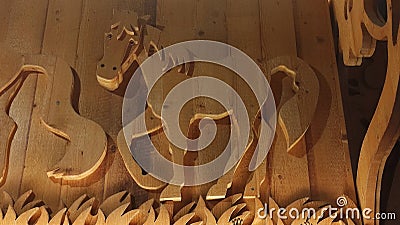 Wood sculture with horseand grass Stock Photo