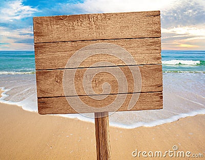 Wood sign on beach background Stock Photo