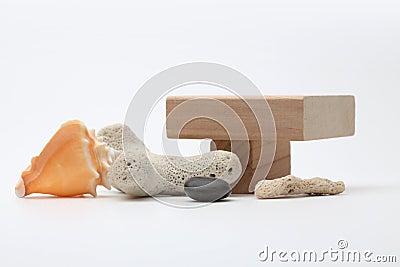 Wood stack cube platform podium and stones, shell on gray light copy spase background. Minimal empty display product presentation Stock Photo