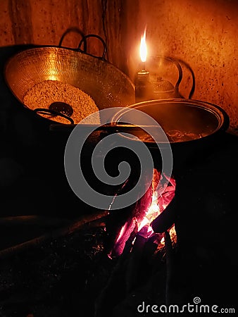 Wood stove. Cooking meals with Clay pots. traditional kitche Stock Photo