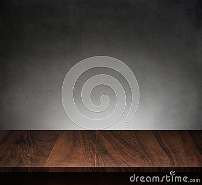 Wood table with dark concrete texture background Stock Photo