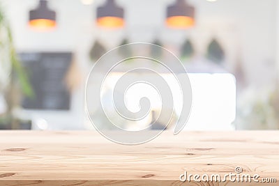 Wood table foreground with blur home cafe kitchen background Stock Photo