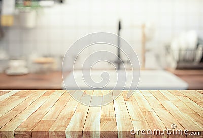 Wood table top on blur kitchen counter roombackground.For montage product display or design key visual Stock Photo