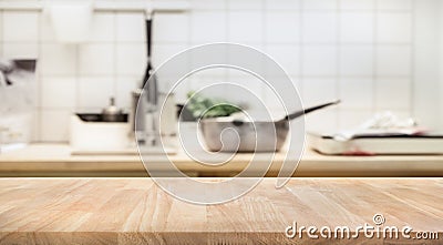 Wood table top on blur kitchen room background Stock Photo