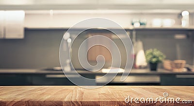 Wood table top on blur kitchen room background Stock Photo