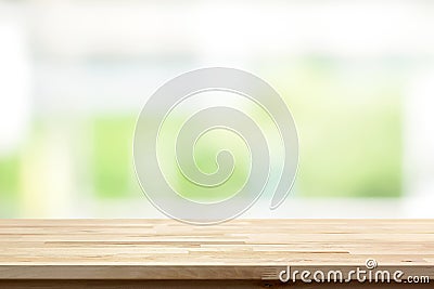 Wood table top on blur white green kitchen window background Stock Photo