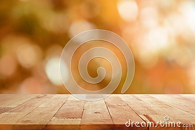 Wood table top on brown bokeh abstract background Stock Photo