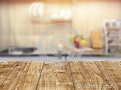 Wood table top in kitchen room blur background for montage product display or backdrop design layout Stock Photo
