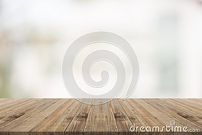 Wood table top on white blurred background from building Stock Photo