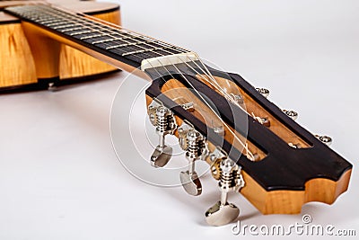 Wood texture of lower deck of six strings acoustic guitar on white background. guitar shape Stock Photo