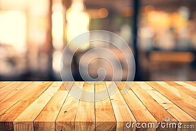 Wood texture table top counter bar with blur light gold bokeh in cafe,restaurant background Stock Photo