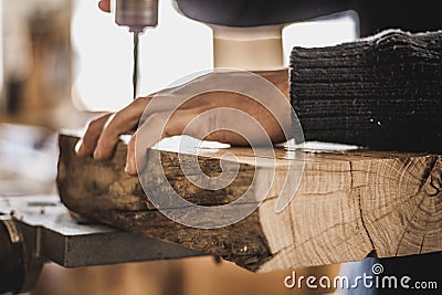 Woodworking art, an honest occupation within a sustainable lifestyle. Carpentry and cutting. Stock Photo