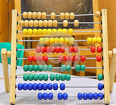 wooden abacus to learn how to count inside the classroom Stock Photo