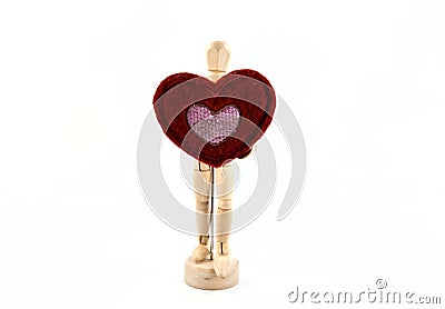 Wooden action figure with heart Stock Photo