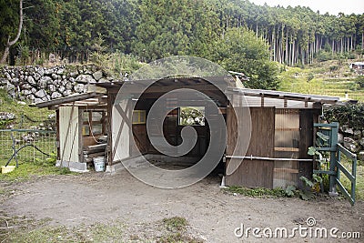 Wooden animal barn on a farm in Japan. Stock Photo