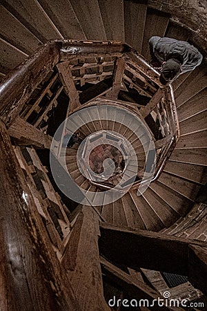 Wooden antique vint twisted staircase to the tower of the royal palace of Nuremberg, Germany Editorial Stock Photo