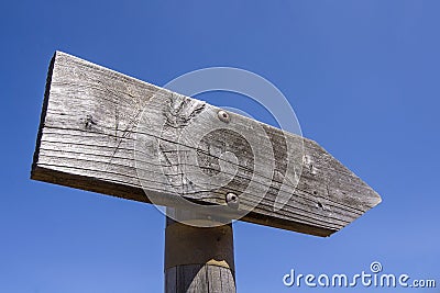 Wooden arrow sign post or road signpost Stock Photo